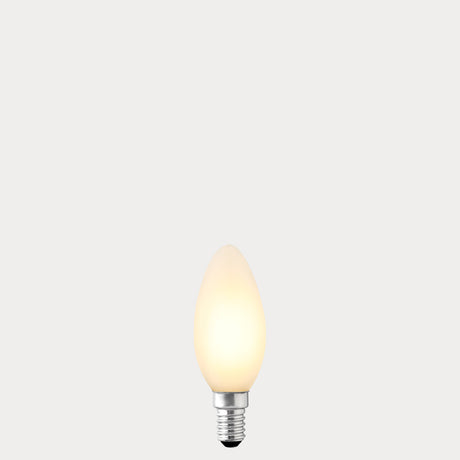 Dulora 4.2W Candle LED Bulb E14 Porcelain in Warm White, glowing with 2700K warm white light.