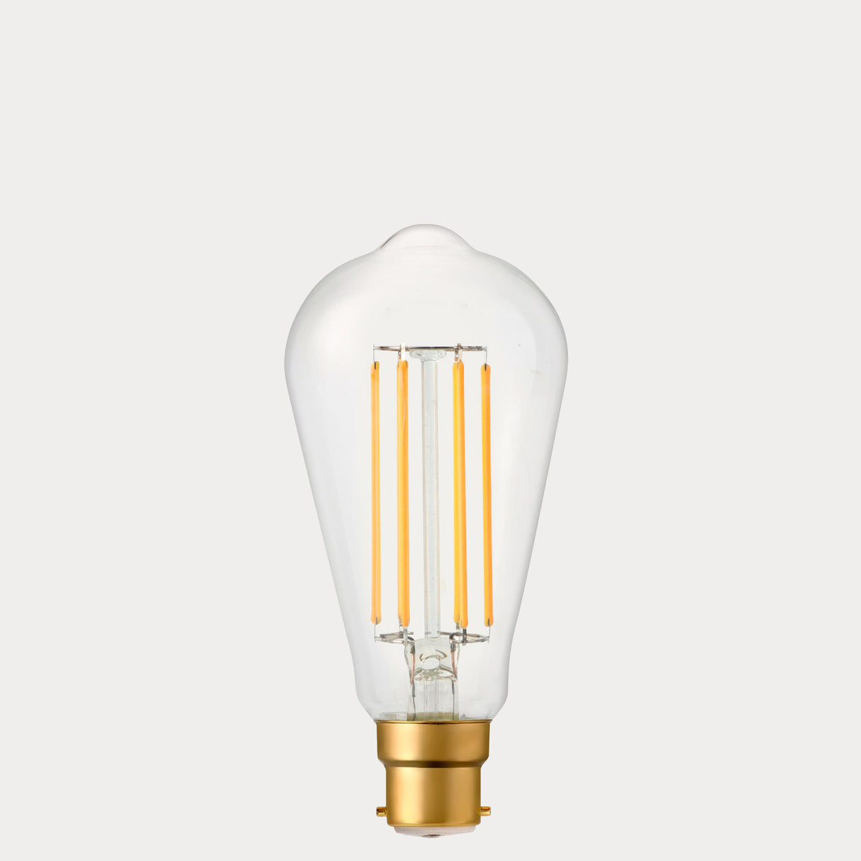 Dulora 4.2W Edison LED Bulb B22 in Extra Warm White with visible amber filaments in clear ST64 glass