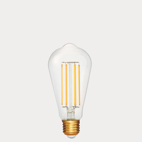 Dulora 4.2W Edison LED Bulb E27 in Extra Warm White with visible amber filaments in clear ST64 glass