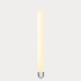 Dulora 4W Long Tube LED Bulb E27 Porcelain in Warm White glowing softly along the length of the porcelain tube